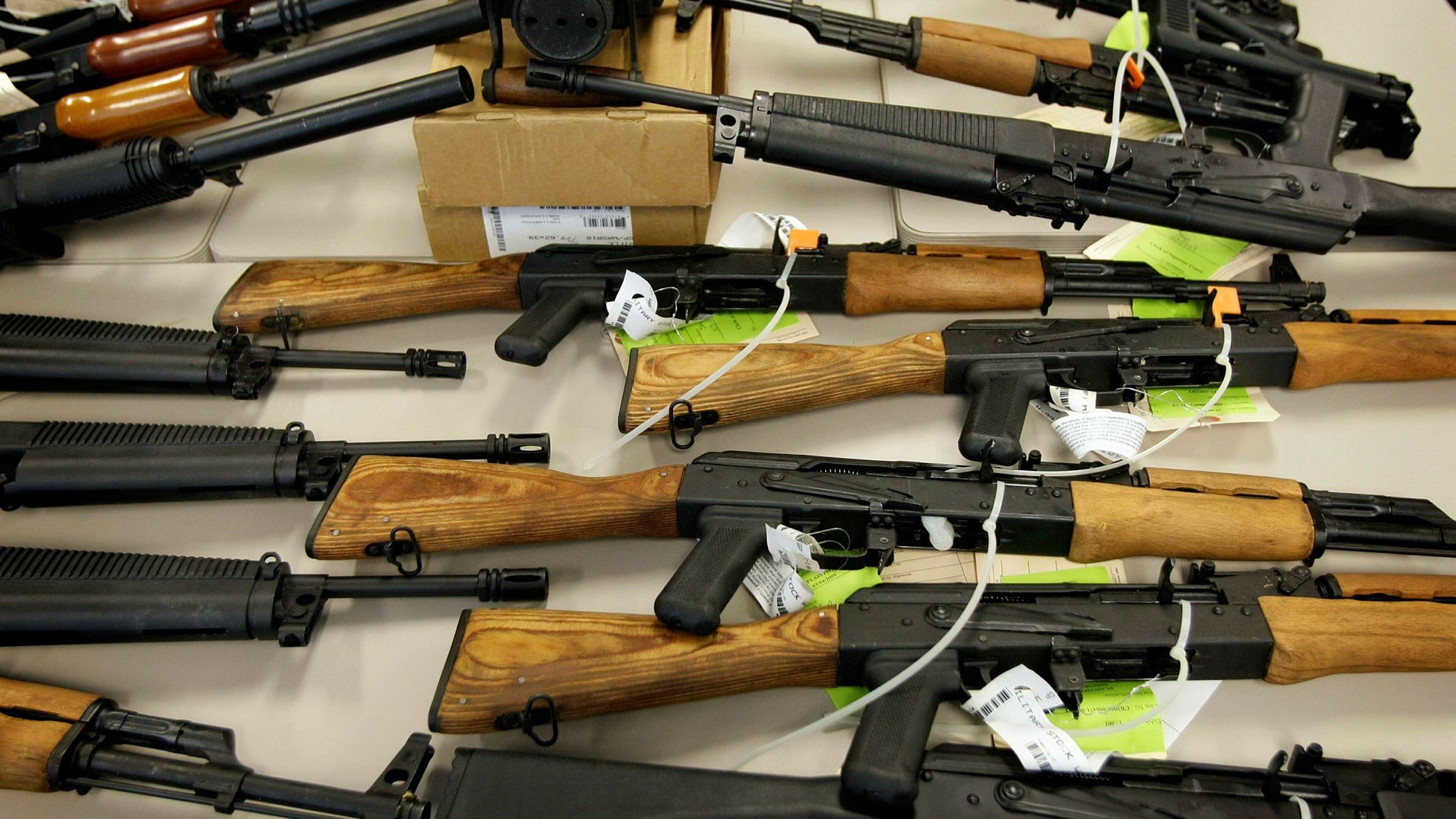 Why are American gun manufacturers being sued?