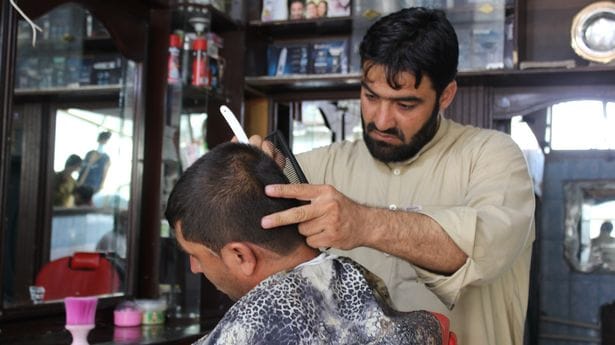 Taliban rule stops shaves, trims, and cuts