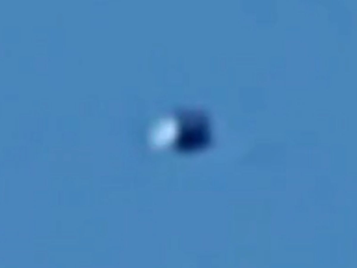 Man films cube-shaped UFO rotating in the sky in Missouri