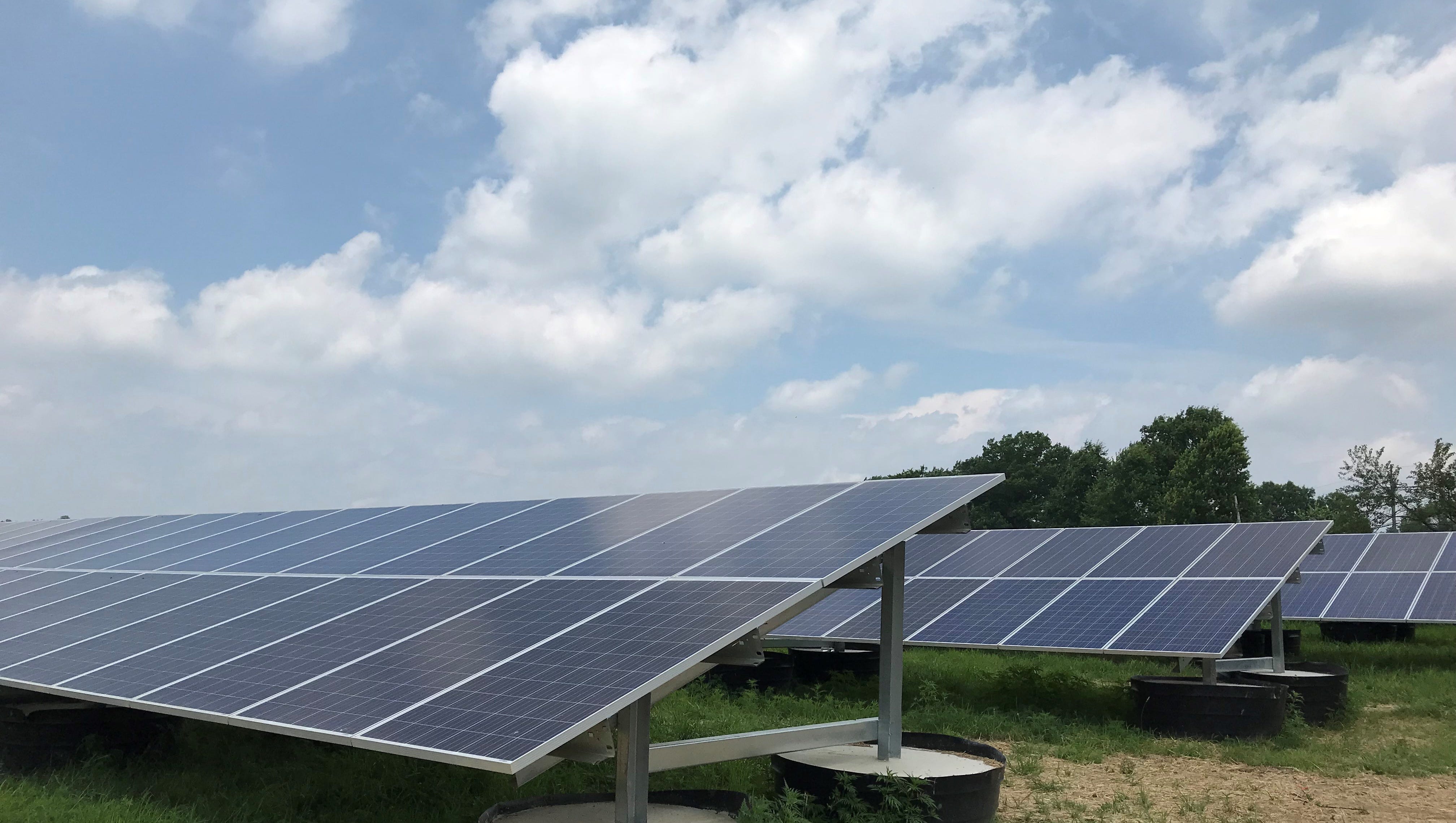 Community solar power project in place of a landfill