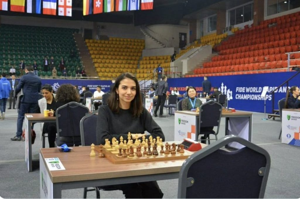 Iranian woman competes without hijab at international chess tournament