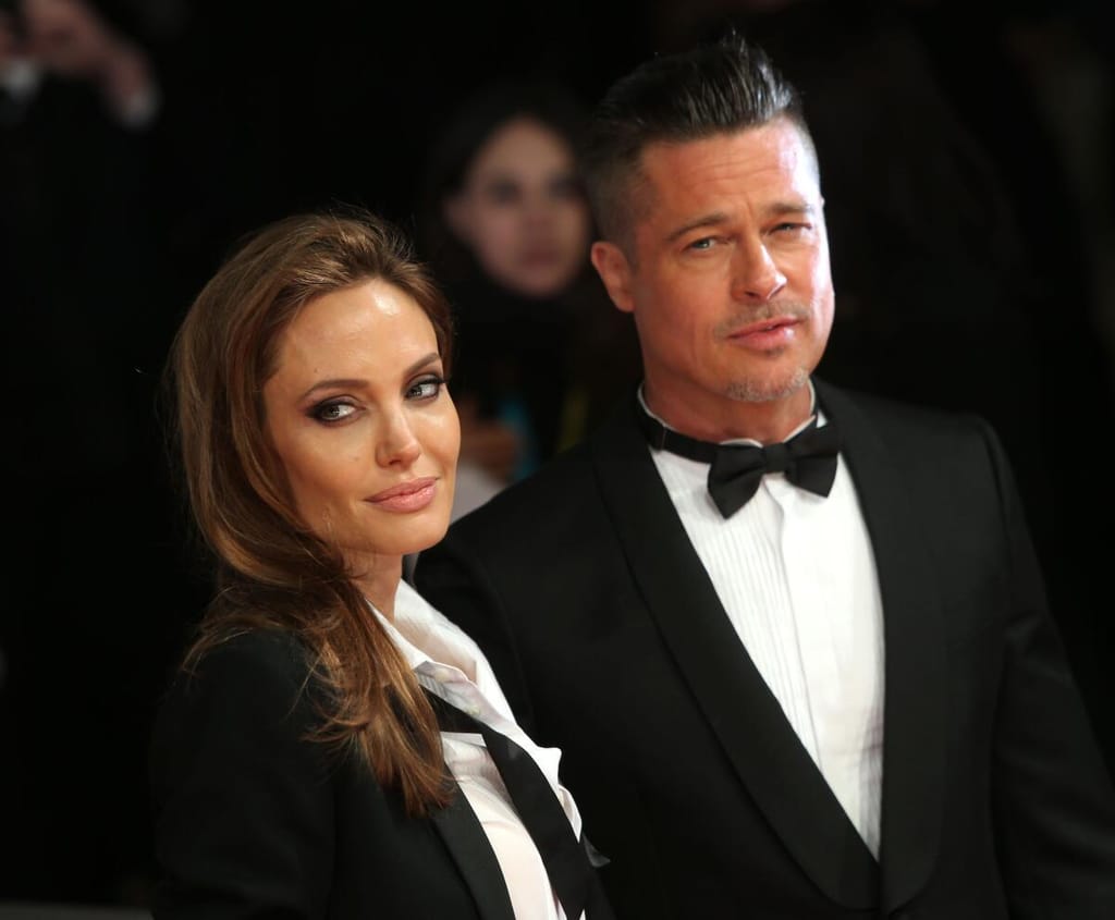 Angelina Jolie accuses Brad Pitt of physical abuse in winery dispute filing