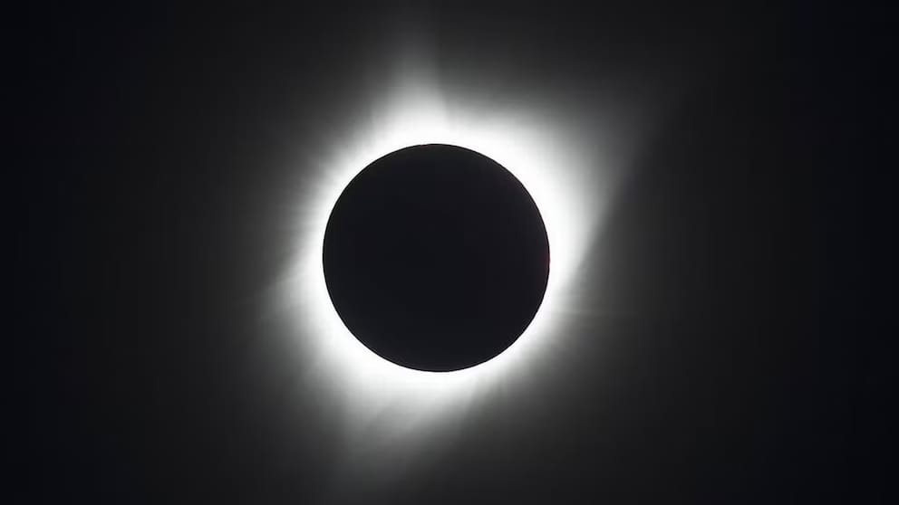 What do scientists aim to learn from the rare total solar eclipse?