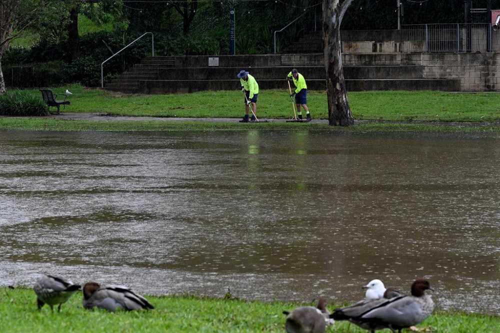 Flooded towns in Australia prepare for more rainfall 