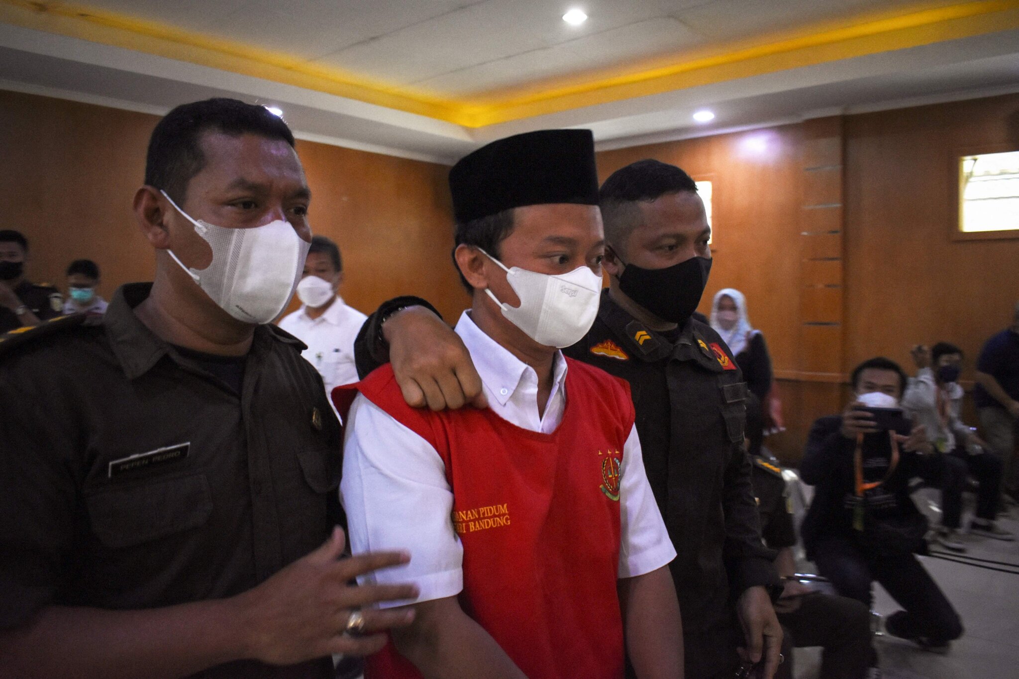 Indonesian court gives death sentence to a teacher for raping 13 students