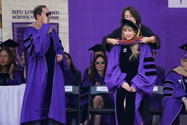 Taylor Swift receives an honorary degree and addresses NYU graduating class