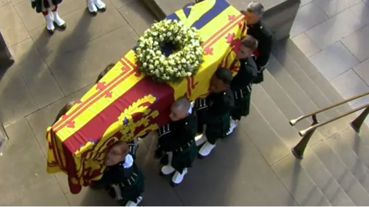 Queen Elizabeth II lies in state after a solemn procession