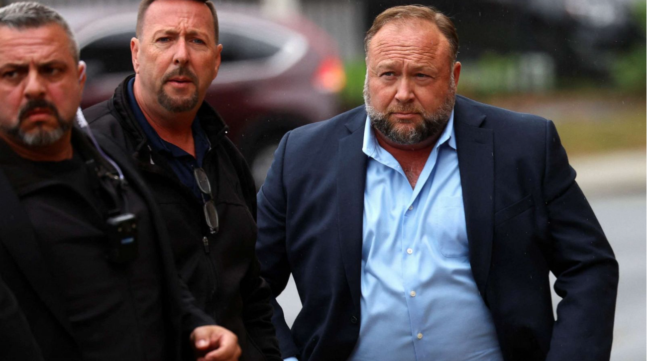 Conspiracy theorist Alex Jones ordered to pay $965 million in damages to Sandy Hook victims’ families