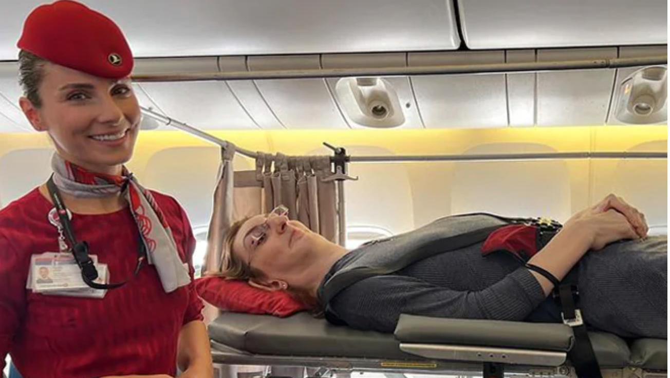 Tallest woman in the world takes her first flight after airline removes six seats
