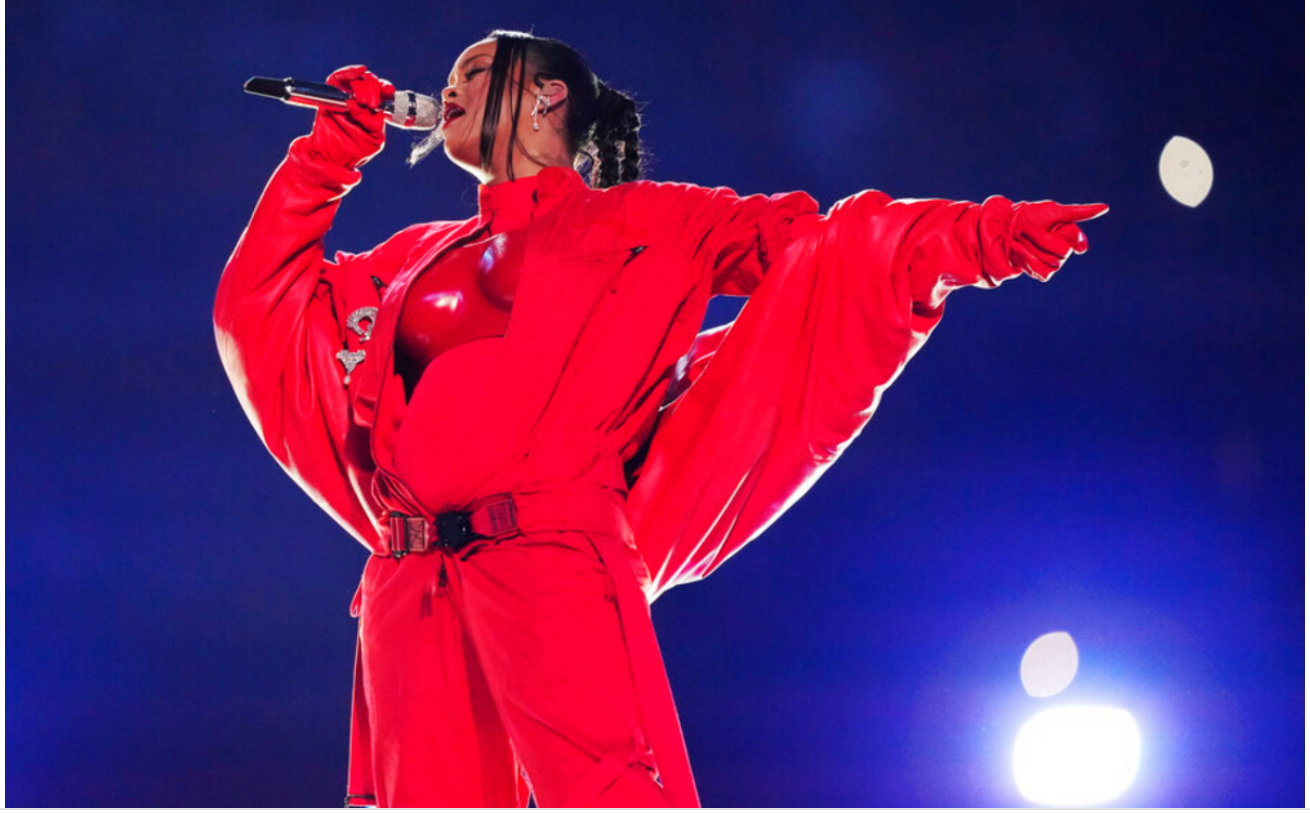 Rihanna announces her pregnancy during the Super Bowl halftime show