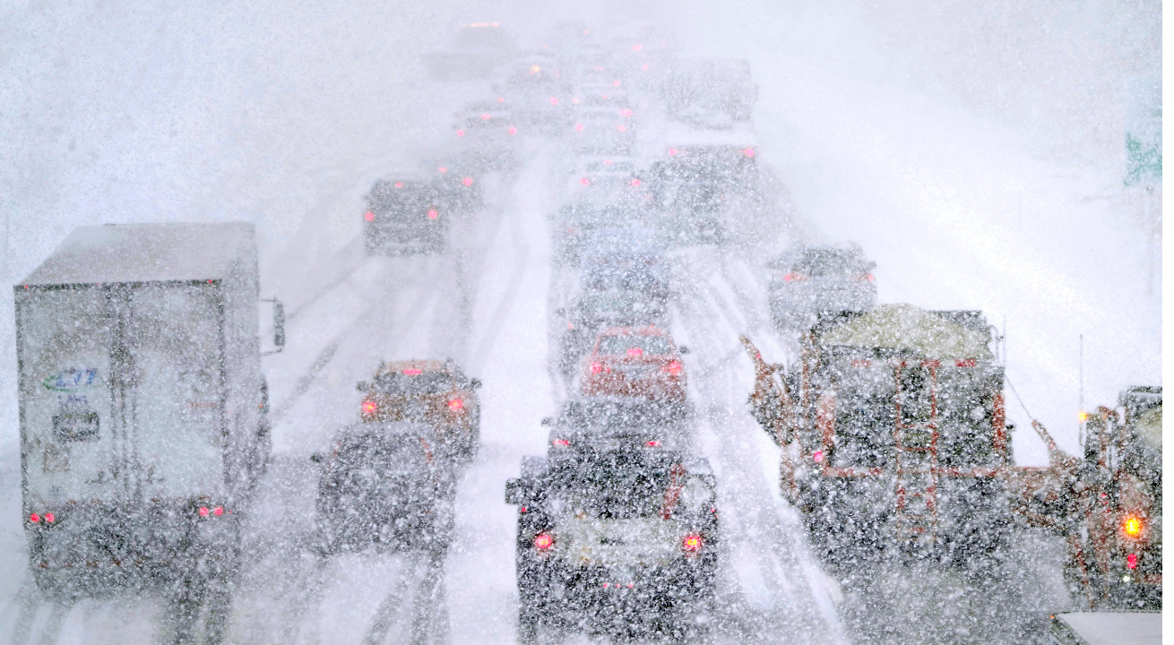350,000 without power as winter storms pound Northeast, California