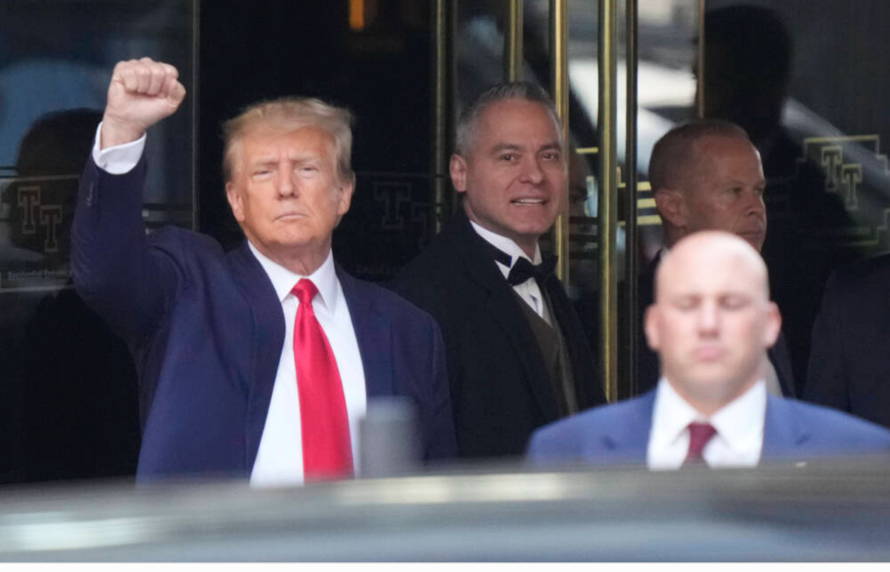 Trump surrenders to NY authorities ahead of arraignment