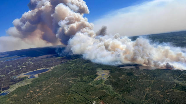 Breathing Hazard: Smoke from Canadian wildfires triggers air quality ...