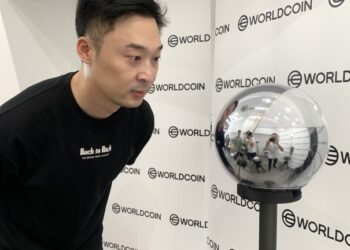 What is WorldCoin, a cryptocurrency project that requires eye scans during registration?