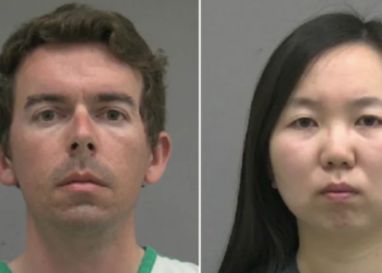 University of Florida scientists arrested after locking their kids in cages while they went to work