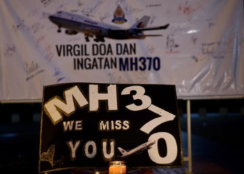 Australian fisherman claims he found part of Malaysia Airlines flight MH370 months after plane went missing