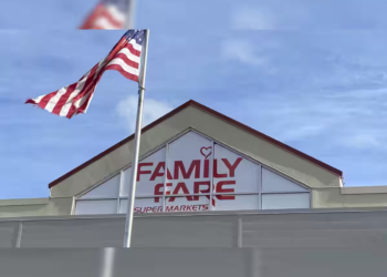 Homeless woman found living inside Michigan rooftop store sign with computer and coffee maker