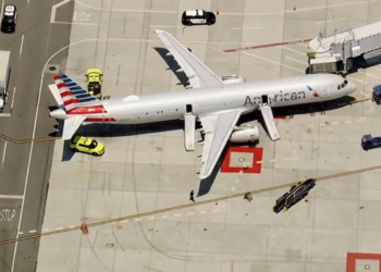 Watch: Smoking laptop forces emergency evacuation on Miami-bound American Airlines flight