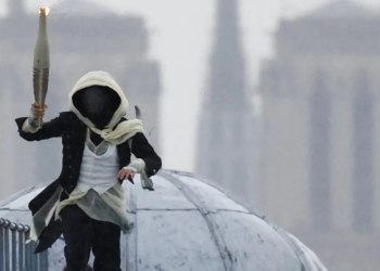 Breezy Explainer: Who was the masked torchbearer at the Paris Olympics opening ceremony?
