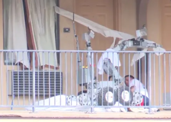Watch: Police robot dodges bullet, deploys tear gas, and captures armed man in Texas motel standoff
