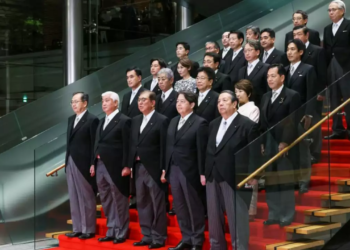 Japan's government has acknowledged altering an official photo of the new cabinet members to improve their appearance after public ridicule over their unkempt attire. The admission came following widespread mockery on social media of several ministers, whose sagging trousers and visible white shirts caused an online stir.