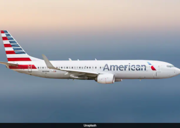 American Airlines passengers duct-tape man after he tries to open plane door mid-flight