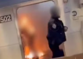 Watch: Video of alleged NYPD cop ‘ignoring’ burning woman on NYC subway sparks outrage