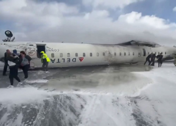 Delta Airlines passengers remember ‘hanging upside down like bats’ after crash