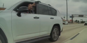 Watch: Driver brandishes apparent holstered gun at Tesla Cybertruck in Texas