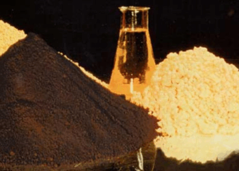 Yellowcake, chemically known as uranium oxide concentrate (U₃O₈), is an intermediate product in the nuclear fuel cycle. It is derived from uranium ore and contains about 80% uranium oxide.