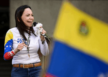 Venezuela warns Nobel laureate Maria Corina Machado will be branded a fugitive if she attends peace prize ceremony