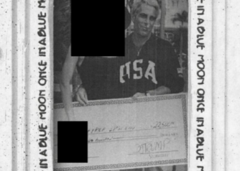Epstein Files Release: First Trump Reference Emerges in Redacted Photo Featuring a $22,500 Novelty Check