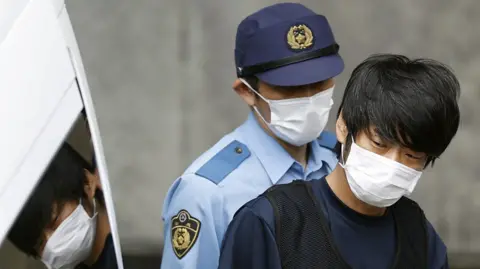 Japanese Court Sentences Shinzo Abe’s Killer to Life Imprisonment
