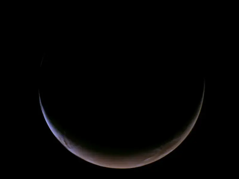 Psyche Mission Captures Rare Crescent View of Mars During Deep-Space Flyby