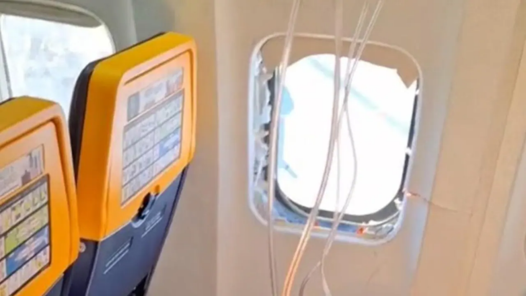 A Ryanair flight returned safely after a reported window failure caused rapid decompression. Here's what happened and why the passenger survived.
