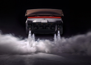Rear view of the Tesla Roadster with cold-gas thrusters firing