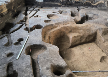 10,500-Year-Old Wood Under German Lake Could Rewrite What We Know About Early Human Homes