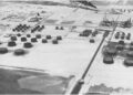 Aerial view of storage tanks and processing units at the Ras Tanura refinery on Saudi Arabia's Gulf coast