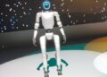 Unitree G1 humanoid robot standing on a lit stage at the Japan Mobility Show 2025 in Tokyo