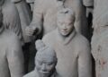 Close-up of clay Terracotta Army warriors standing in rows in Pit 1 near Xi'an, China