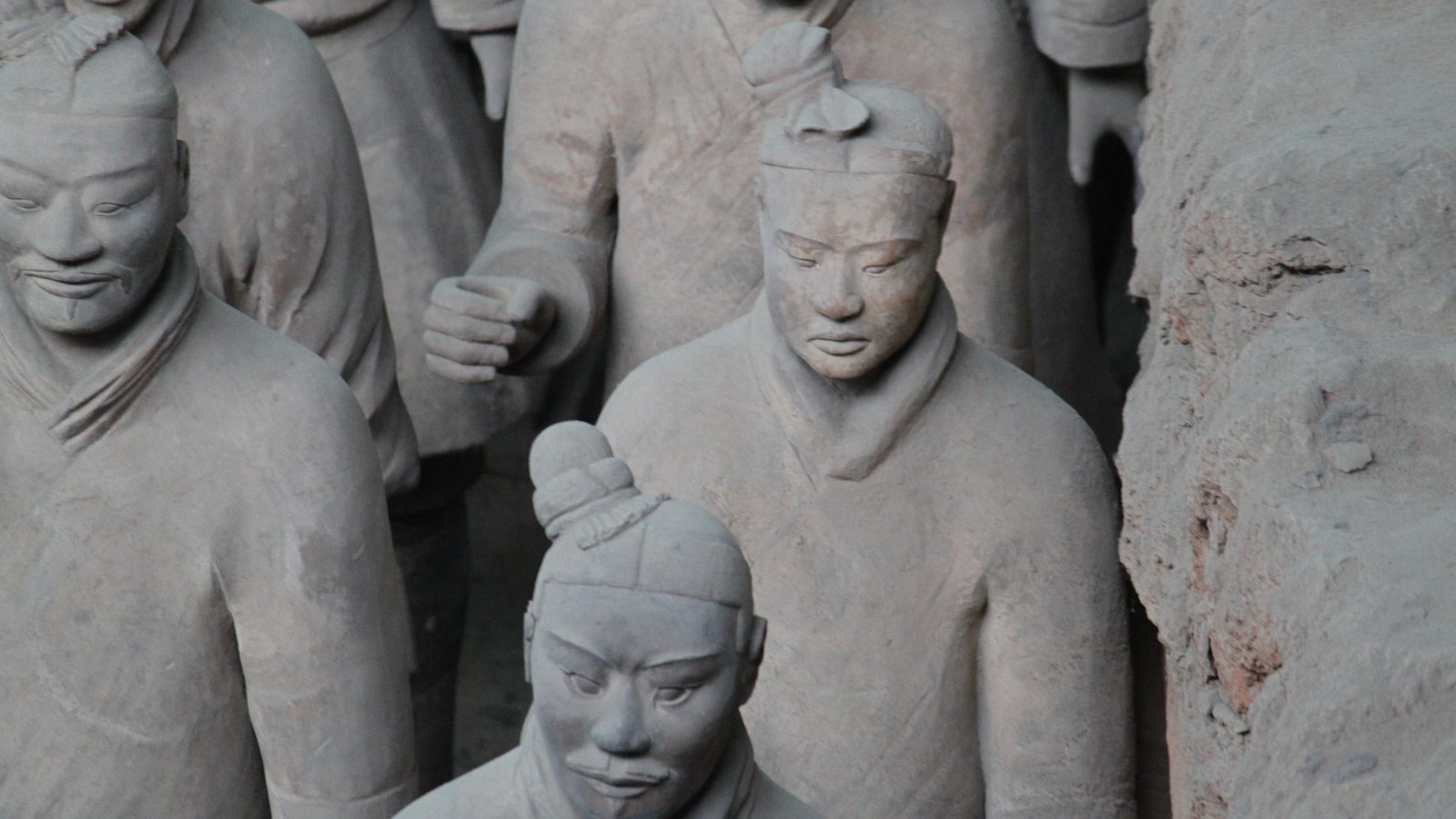 Close-up of clay Terracotta Army warriors standing in rows in Pit 1 near Xi'an, China