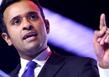 Vivek Ramaswamy speaking on stage at AmericaFest in Phoenix, Arizona, in December 2025