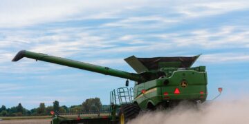 A combine harvesting soybeans on an Indiana farm