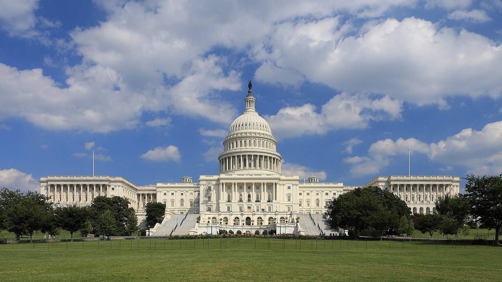 The west front of the US Capitol in Washington under a blue sky