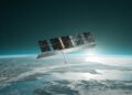 Artist's rendering of an ICEYE synthetic aperture radar satellite with solar panels orbiting above Earth