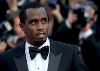 Sean Combs in a tuxedo on the red carpet at the 2012 Cannes Film Festival